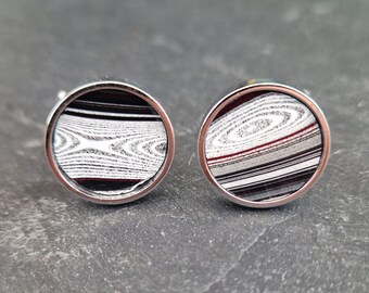 Cufflinks with fordite insert and epoxy resin coating