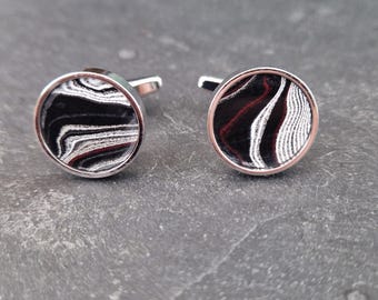 Cufflinks with fordite insert and epoxy resin coating