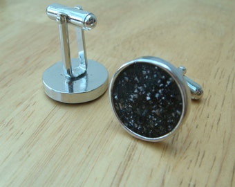 ¡Trae un pedacito del espacio exterior a la oficina! Gemelos que contienen auténticas partículas de meteorito.