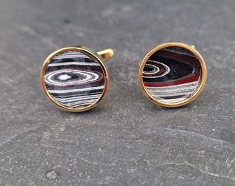 Cufflinks with fordite insert and epoxy resin coating