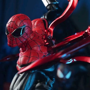 May include: A detailed action figure of Spider-Man in a dynamic pose, featuring a red and black suit with web detailing. The figure has a glossy finish and is set against a dark blue background. Red metallic accents extend from the figure.