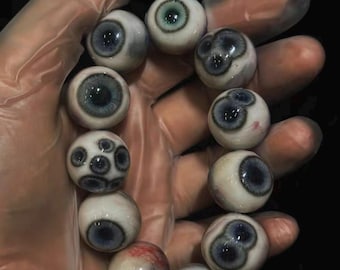 Cthulhu Eyeball Bracelet “Degeneration & Dissolution” — made of resin and Belgian polymer clay.