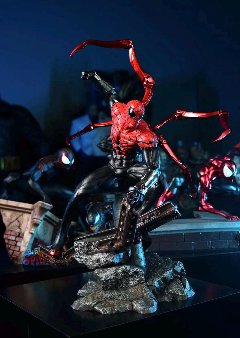 May include: A detailed action figure of Spider-Man in a dynamic pose, featuring a red and black suit with metallic red appendages. The figure is set against a dark background with other figures.