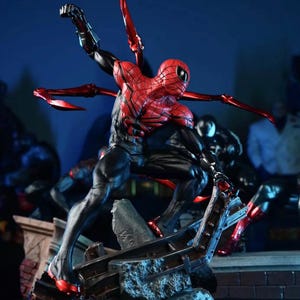 May include: A dynamic action figure of Spider-Man in a striking pose, clad in a red and black suit with multiple mechanical arms. The figure is set against a dark blue backdrop, with a detailed base.