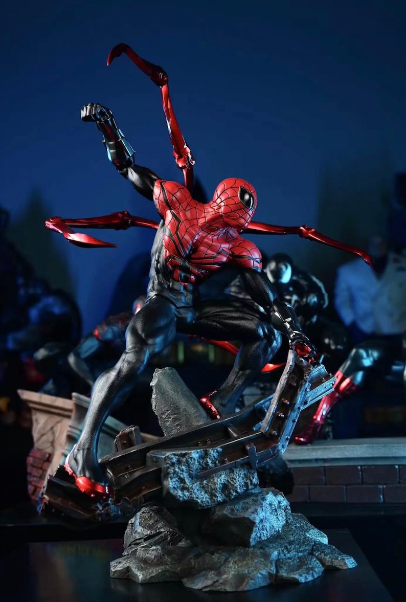 May include: A dynamic action figure of Spider-Man in a striking pose, clad in a red and black suit with multiple mechanical arms. The figure is set against a dark blue backdrop, with a detailed base.