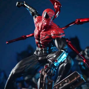 May include: A detailed action figure of Spider-Man in a dynamic pose. The figure features a red and black suit with intricate web detailing, and metallic red mechanical arms extending from the back. The figure is set against a dark blue background.