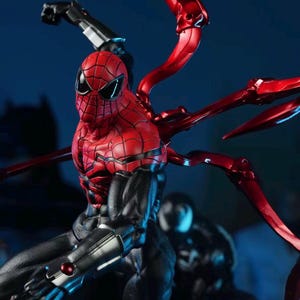 May include: A detailed action figure of a superhero in a dynamic pose. The figure features a red and black color scheme with metallic accents. The figure has multiple articulated limbs and a detailed mask. The background is a dark blue.