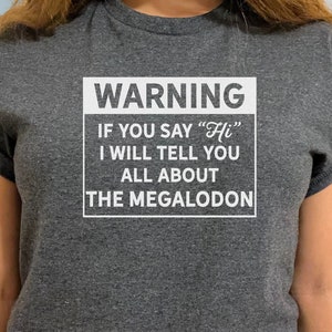 T-SHIRT DIVERTENTE AVVERTENZA PUÒ INIZIARE SPONTANEAMENTE A - Foto 8