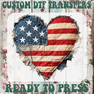 May include: A heart-shaped design featuring the American flag, with red and white stripes and a blue field with white stars. The design is made of denim and fabric, with frayed edges and visible stitching. The text "CUSTOM DTF TRANSFERS" and "READY TO PRESS" are at the top and bottom.