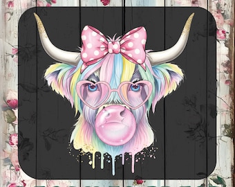 May include: A graphic print labeled CUSTOM DTF TRANSFERS READY TO PRESS featuring a pastel-colored highland cow with a pink polka-dot bow, heart-shaped glasses, and a pink bubblegum bubble, set against a dark gray background with floral accents.