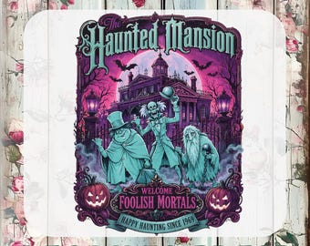 May include: A graphic DTF transfer featuring The Haunted Mansion with three ghosts, a mansion, bats, and two jack-o'-lanterns in purple and teal tones. Text reads: The Haunted Mansion, Welcome Foolish Mortals, Happy Haunting Since 1969, Custom DTF Transfers, Ready To Press.