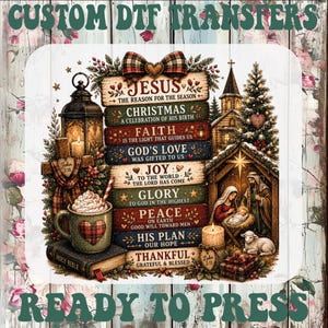 May include: A custom DTF transfer sheet featuring a stack of wooden signs with religious Christmas text, a lantern, a mug of cocoa, a Bible, a nativity scene, and a Christmas tree. The text reads CUSTOM DTF TRANSFERS READY TO PRESS.