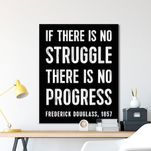 May include: Black and white motivational quote print with the text "If there is no struggle there is no progress" and the author "Frederick Douglass, 1857".