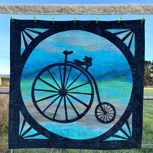 On Your Bike! - a delightful quilt pattern, great wall hanging, featuring a silhouette of a penny farthing style bike - digital download
