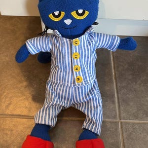 Peluche Pete le chat en pyjama 33 cm
