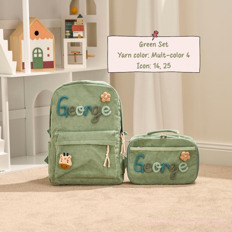 May include: A green corduroy backpack and matching lunch bag set. The backpack and lunch bag have the name "George" embroidered in blue and green yarn. The backpack features a giraffe patch and a flower applique.