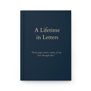 May include: A navy blue journal featuring the gold text "A Lifetime in Letters". The quote "Every page carries a piece of my love through time" is below the title. The journal has a simple, elegant design.
