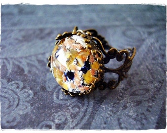 Round Black and Gold Opal Glass Ring - Black and Gold Opal Glass Cabochon on an Ornate Antique Brass Filigree Band