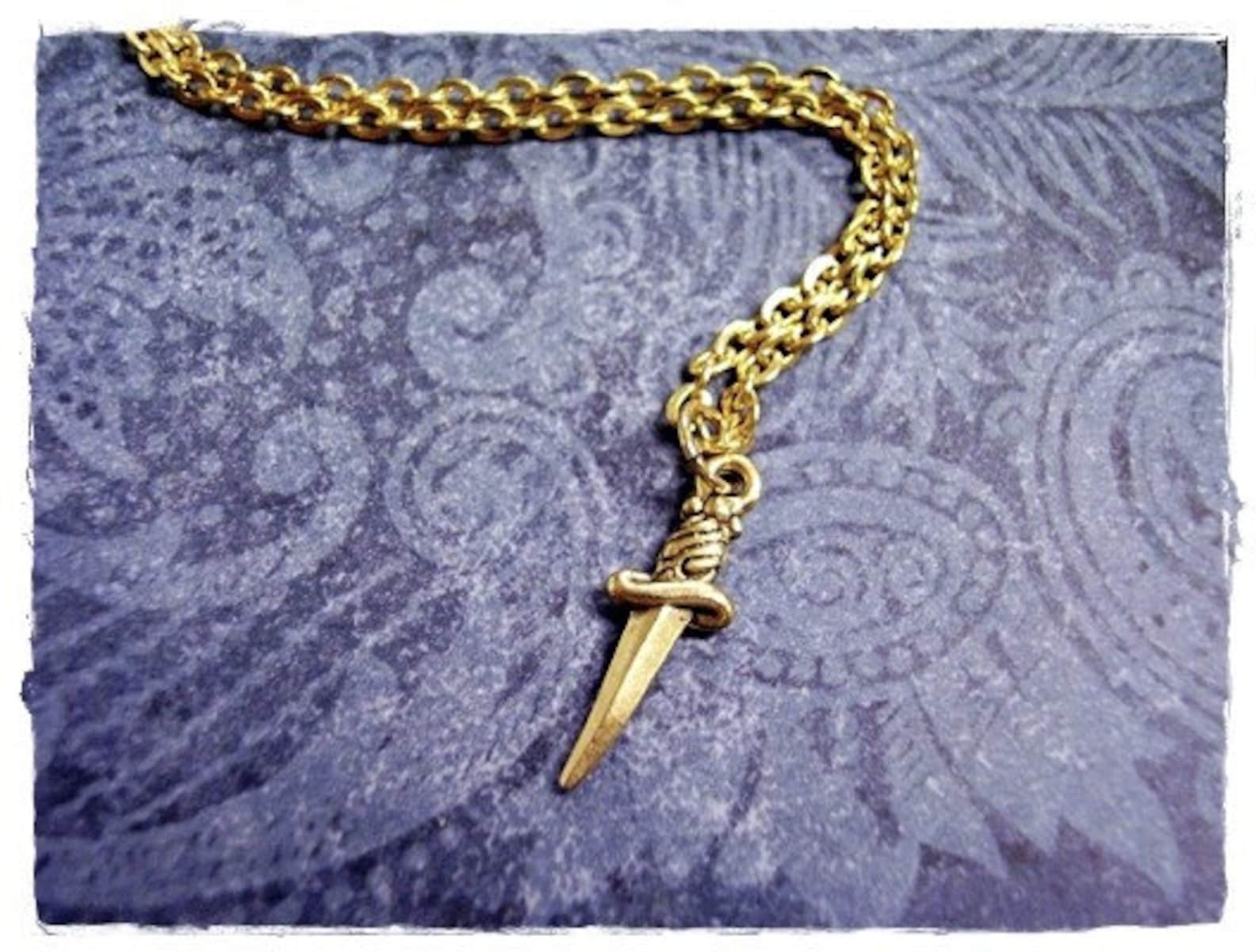 Tiny Gold Dagger Necklace - Antique Gold Pewter Dagger Charm on a ...