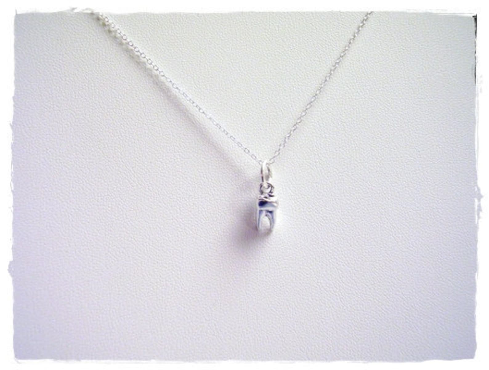 Silver tooth necklace Clearance
