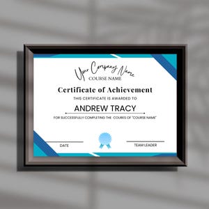 May include: A blue and white certificate of achievement with a blue ribbon and star. The certificate is awarded to Andrew Tracy for successfully completing the course of "COURSE NAME".