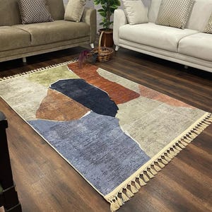 Alfombra abstracta colorida con flecos, moderna, antideslizante y lavable, ideal para sala de estar y dormitorio.