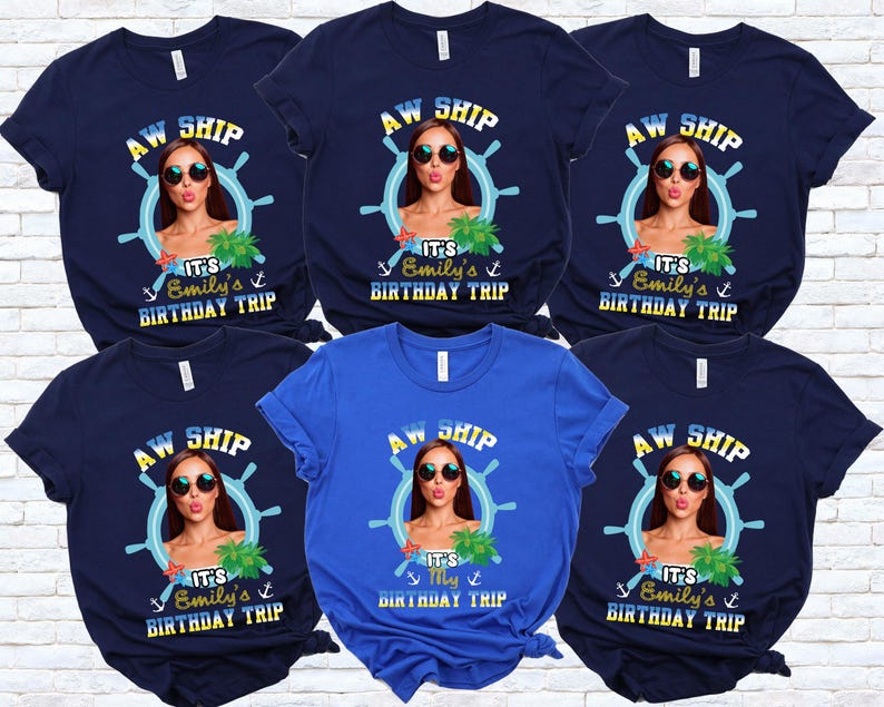 May include: A collection of navy blue and blue t-shirts. Each shirt features a graphic with the text "AW SHIP", a woman wearing sunglasses, a ship's wheel, and the text "It's Emily's Birthday Trip".