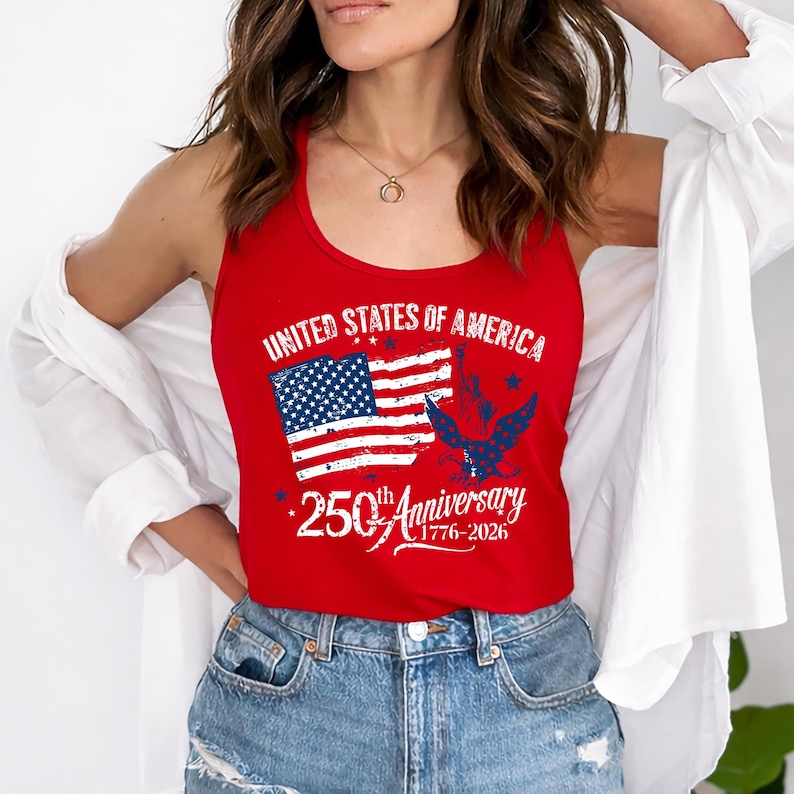 May include: A red tank top featuring the text "United States of America" and a graphic of the American flag and an eagle. The tank top commemorates the 250th anniversary, 1776-2026.
