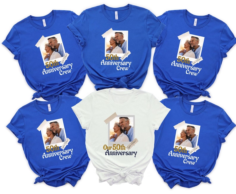 May include: A collection of blue and white t-shirts. Each shirt features a photo of a couple and the text "50th Anniversary Crew." One shirt reads "Our 50th Anniversary." The shirts are short-sleeved and suitable for a group celebrating a milestone.