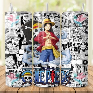 Może przedstawiać: Trzy kubki ze stali nierdzewnej ze słomkami, z motywem w stylu mangi. Centralny kubek przedstawia postać w czerwonej kurtce i słomkowym kapeluszu. Kubki pokryte są czarno-białymi panelami komiksowymi i napisem "ONE PIECE".