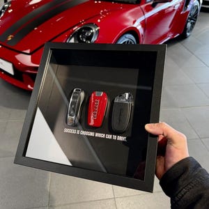 Supercar Trinity Frame by FramedCash | Ferrari, Porsche & Lamborghini Key Frame | &quot;Success Is Choosing Which Car to Drive&quot; 25x25cm