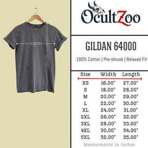 May include: A gray Gildan 64000 t-shirt hangs on a wooden hanger. The shirt is 100% cotton, pre-shrunk, and relaxed fit. Size chart shows measurements in inches, with widths from 16.00" to 32.00" and lengths from 27.00" to 35.00". The brand logo "OcultZoo" is visible.