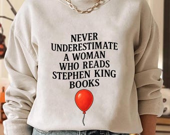 Never Underestimate A Woman Who Reads Stephen King Books Shirt, Horror Reader Gift, Scary Novel Fan T-Shirt, Spooky Literature Tee