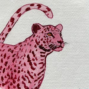 May include: A pink leopard painting on a white background. The leopard has dark red spots and a curved tail. The leopard's eyes are a golden color, and it has whiskers. The painting is done in an impressionistic style.