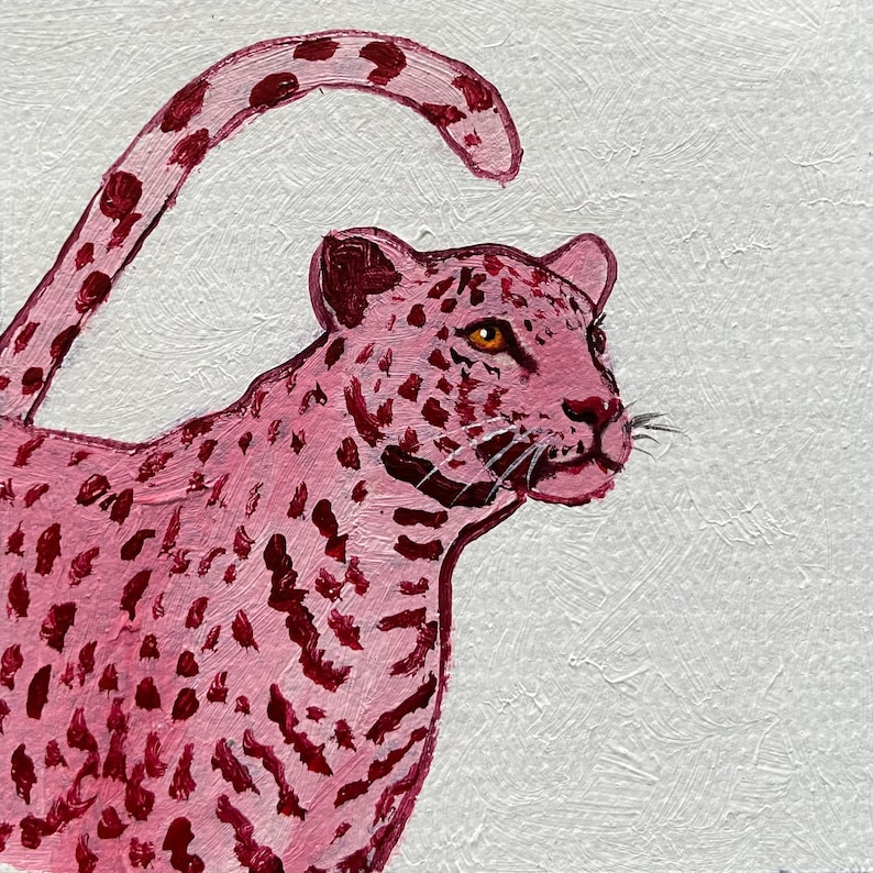 May include: A pink leopard painting on a white background. The leopard has dark red spots and a curved tail. The leopard's eyes are a golden color, and it has whiskers. The painting is done in an impressionistic style.