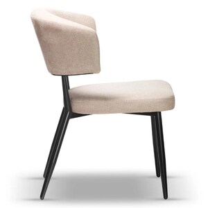 May include: A beige upholstered dining chair with a curved back and black metal legs.