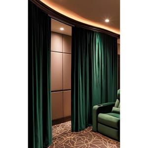 May include: A home theater room with dark green velvet curtains and a plush green armchair. The room has a brown patterned carpet and a brown wall with square panels.