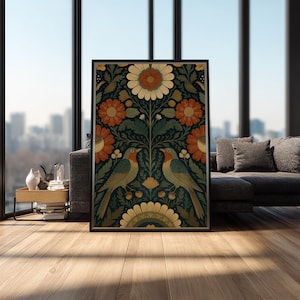 May include: Framed art print featuring a symmetrical design with two birds facing each other. The artwork showcases a floral pattern with orange, cream, and green hues against a dark background. The print is displayed in a black frame.