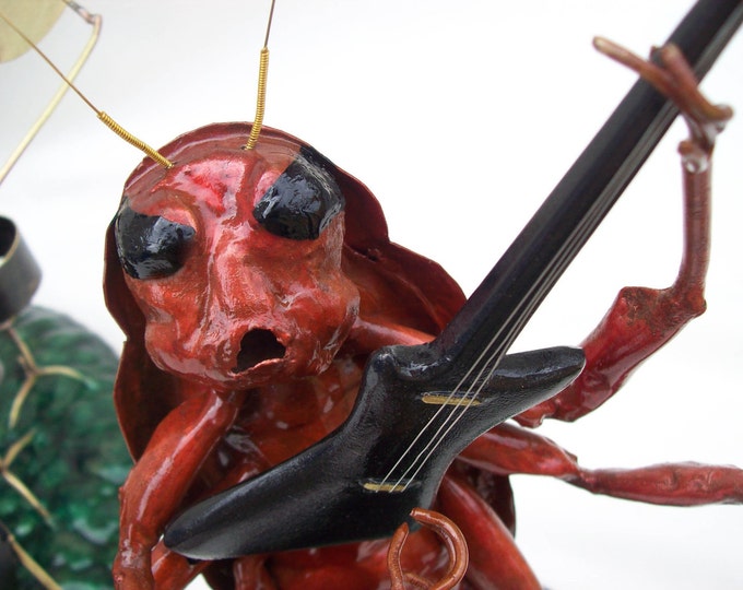 Arlof, Bass and Lead Guitarist of Roach  D.O.A. Copper and Brass Metal Sculpture