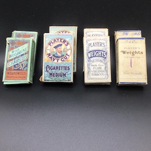 Selection of empty early 1900s cigarette boxes