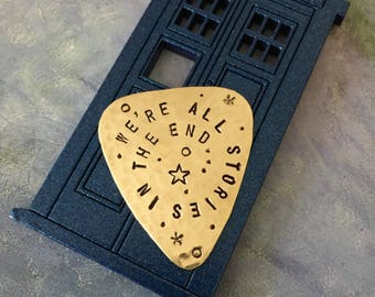 Doctor Who Guitar Pick: Hand Stamped Brass Plectrum - "We're All Stories"