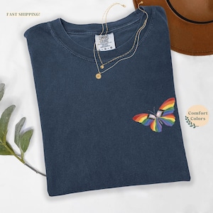 May include: A rustic wooden sign with the text "Welcome to our home" in white lettering. The sign features a distressed finish and a simple, inviting design, perfect for entryway decor.