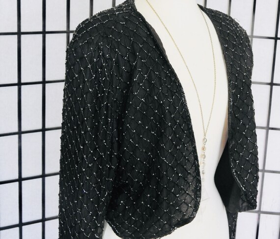 Vintage 1980s beaded jacket with shoulder pads