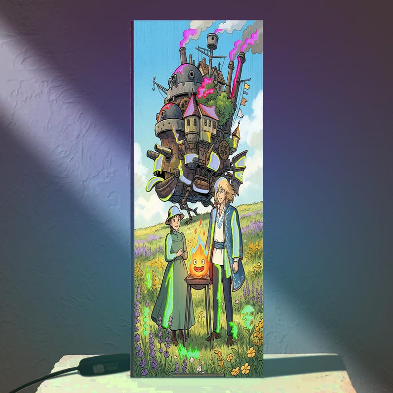 May include: A rectangular vertical light panel featuring a colorful illustration of a large, complex mechanical castle floating above a grassy field with two figures standing near a small, glowing orange fire spirit in a metal cooking stand.