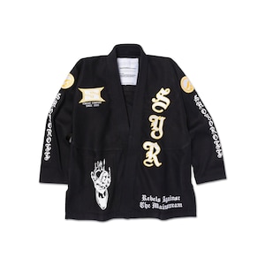 May include: Black martial arts gi with gold embroidery. The gi features the text "SYR" and "Rebels Against The Mainstream".