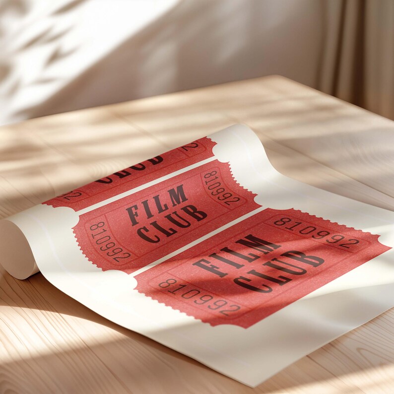 May include: A roll of white paper with three red tickets printed with the text "Film Club" and the number "810992".