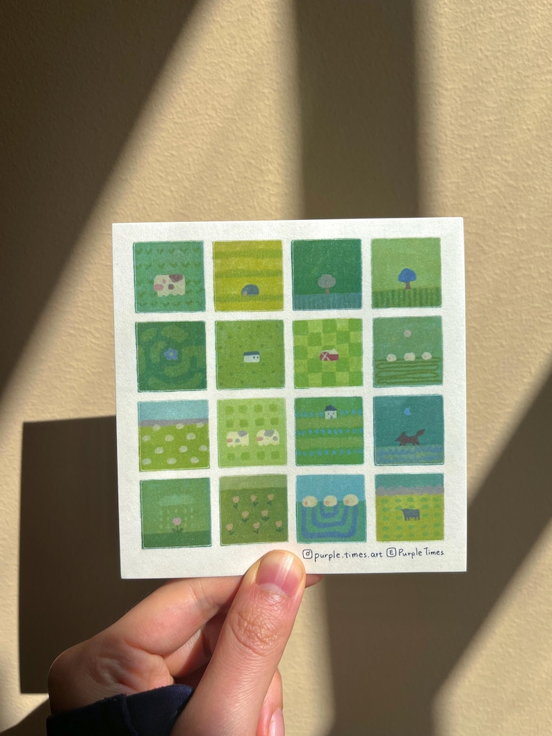 May include: A square art print featuring a grid of sixteen small illustrations in various shades of green. Each square depicts a different landscape scene with elements like trees, houses, animals, and flowers. The text purple.times.art Purple Times is printed at the bottom right corner.
