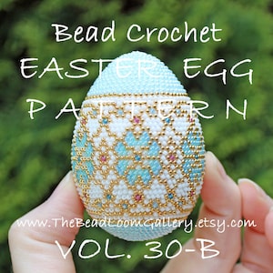 May include: A beaded Easter egg crochet pattern, featuring a blue, white and gold design. The egg is held in a hand, and the text "Bead Crochet Easter Egg Pattern Vol. 30-B" is visible below the egg.