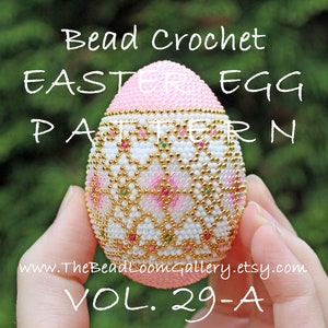 May include: A pink and white beaded Easter egg crochet pattern with gold accents. The pattern is called "Vol. 29-A" and is available on Etsy at www.TheBeadLoomGallery.etsy.com.