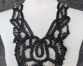 Cute   embroidered  and beaded  applique  black color